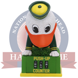 The Oregon Duck Oregon Ducks Mascot Push-Up Counter Bobblehead